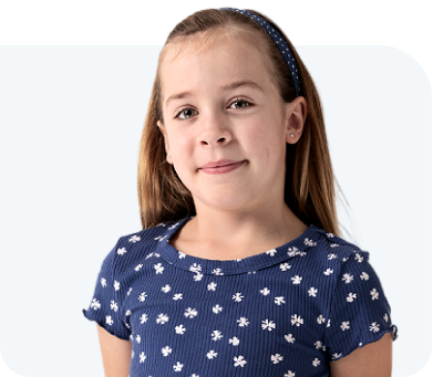 Cora, a person living with XLH, smiling