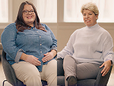 Kelly and Amanda, people living with XLH, sitting together